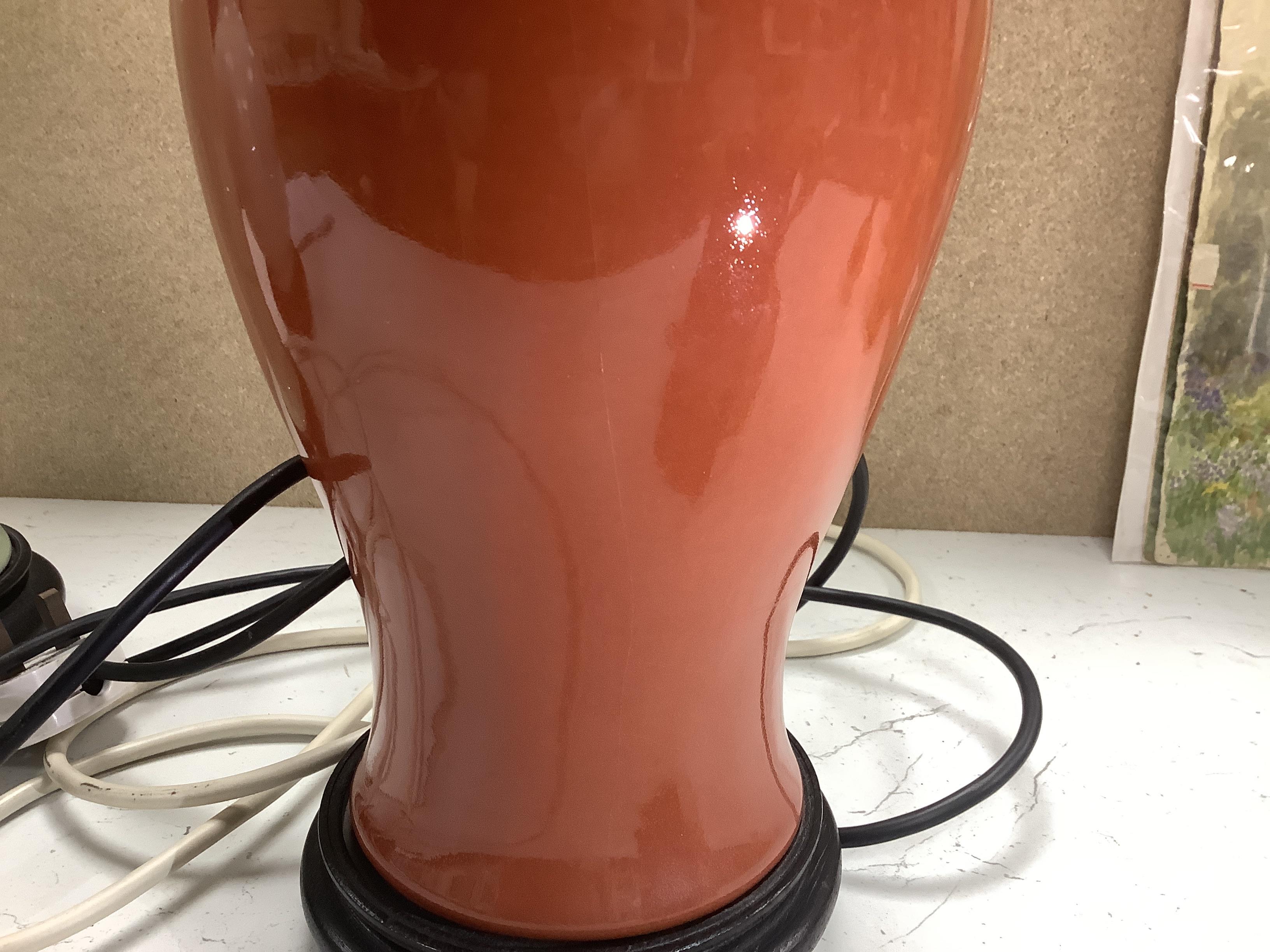 Three Chinese monochrome porcelain lamp bases, 20th century, tallest 38cm high